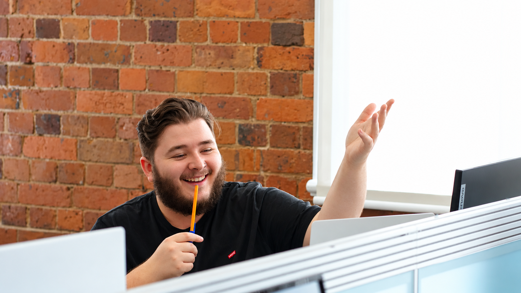 Web Viral Solutions team member collaborating in the office